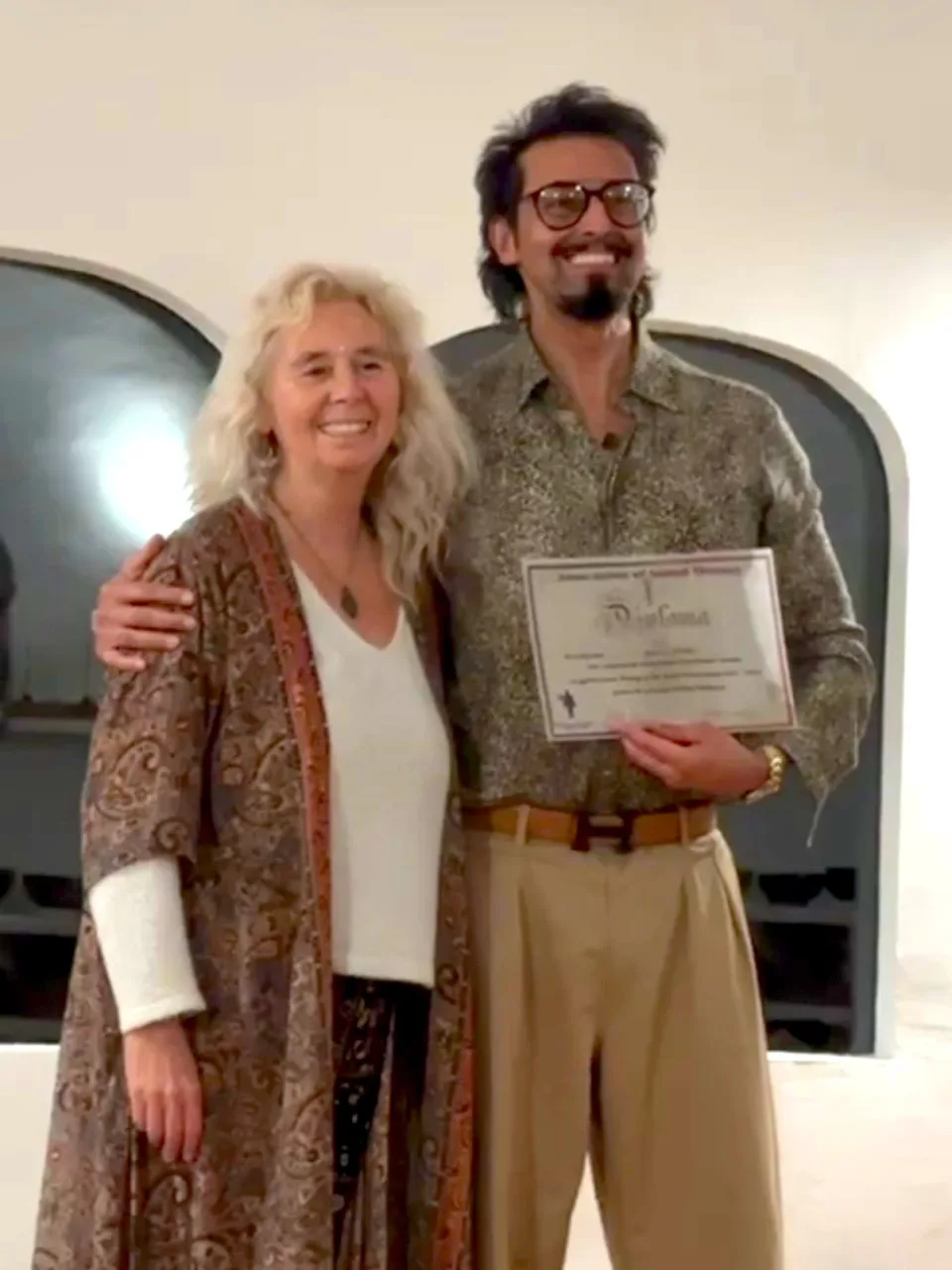 armand receiving diploma for sound healing in spain